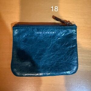 Rebecca Minkoff Turquoise Coin Purse with Can't But Me Love written on it. (18)